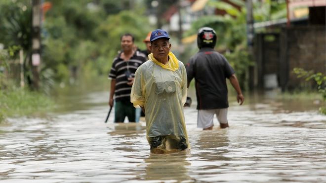 Thailand floods: 12 dead as record rainfall persists